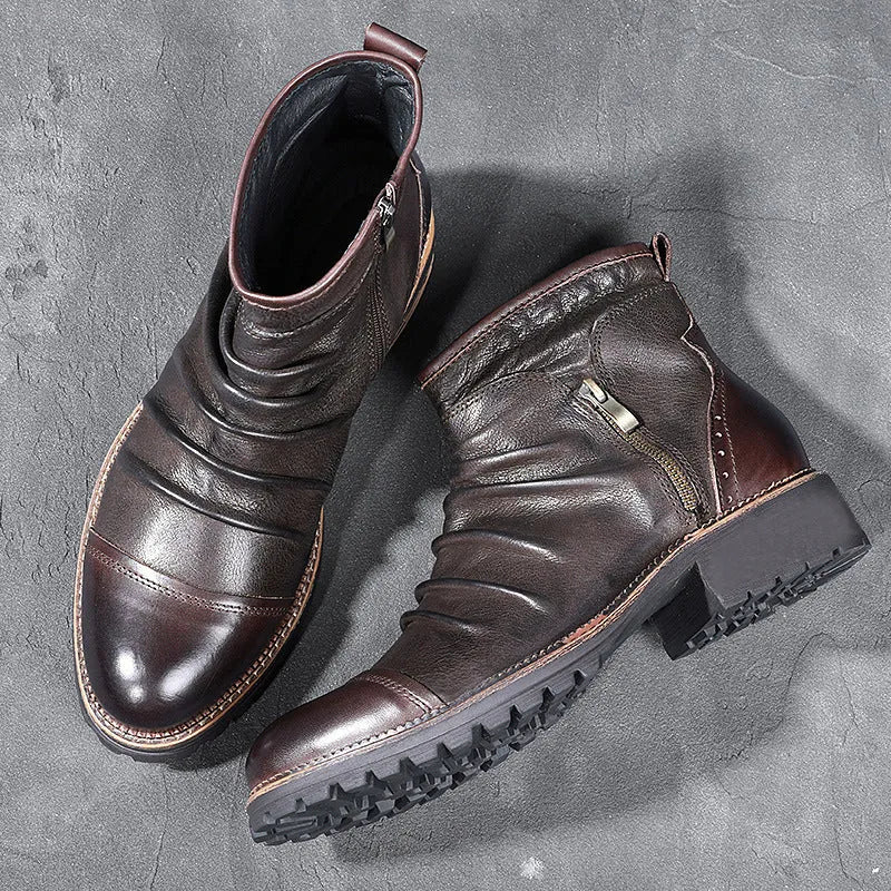 Brown mid-calf cowboy boots with a side zipper, round toe, and a medium horseshoe heel.