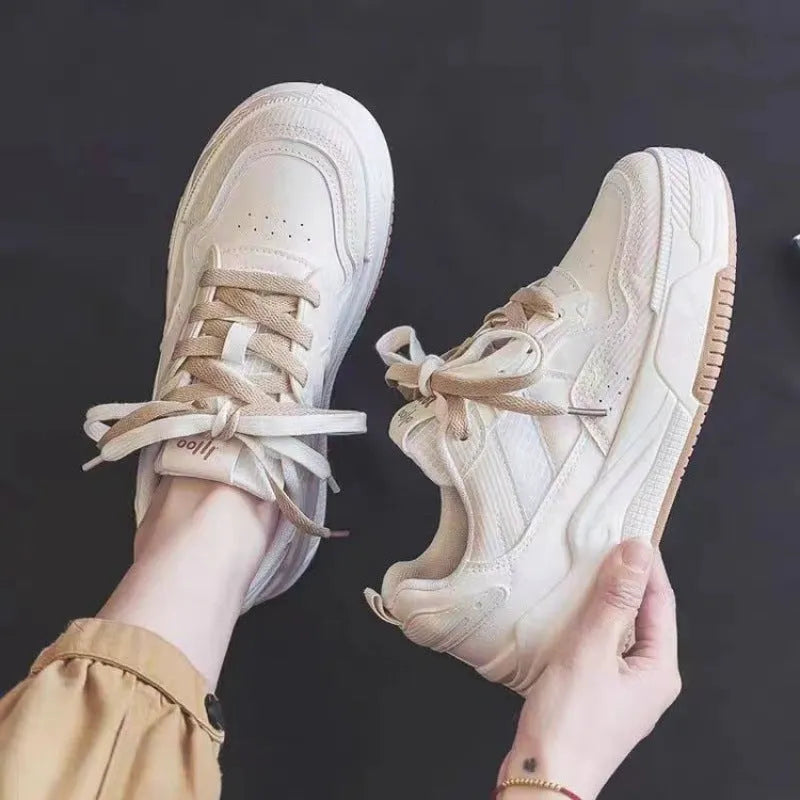 Spring rubber sneaker low top in pink and milky white colours with height increasing function