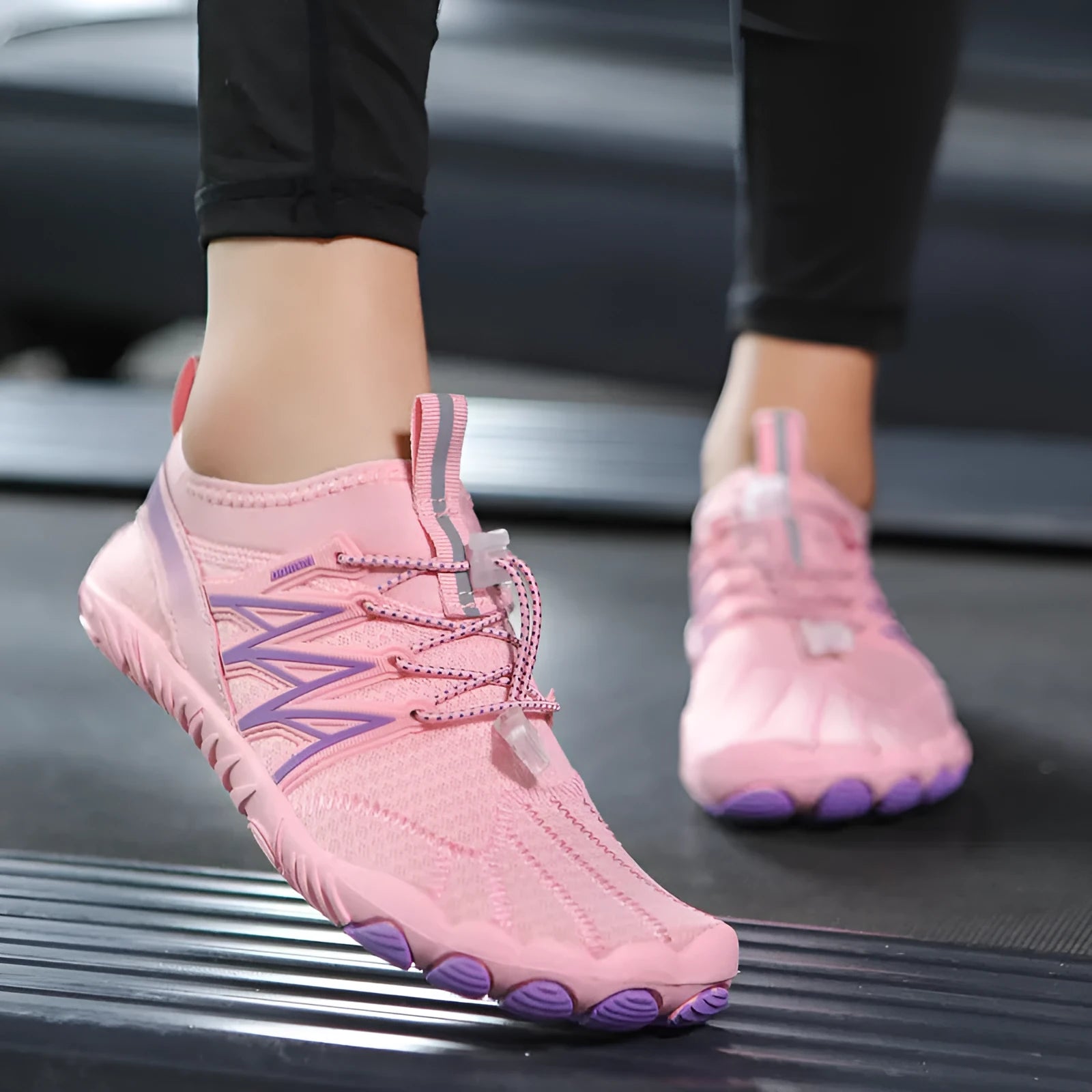 Lightweight striped training sneakers with a mesh upper and non-slip rubber sole in multiple colour options.