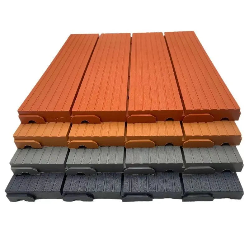 Square plastic floor tile with wood grain texture in a dark grey colour, shown on a light background.