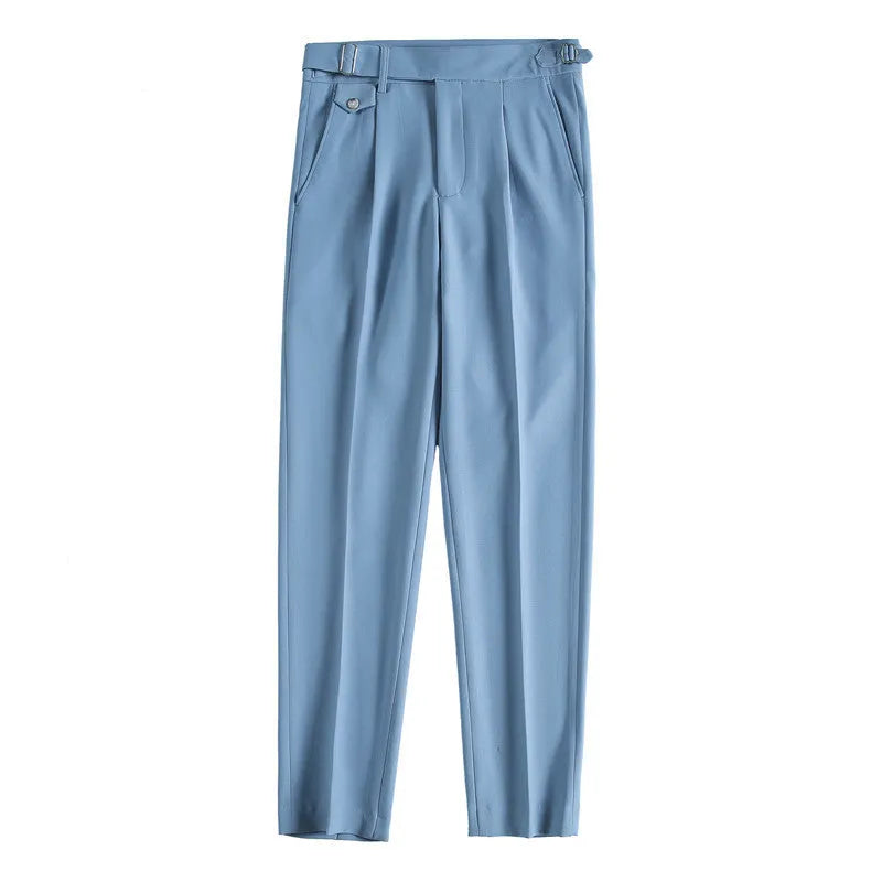 Men's straight leg casual trousers in solid colours including black and grey on a hanger.