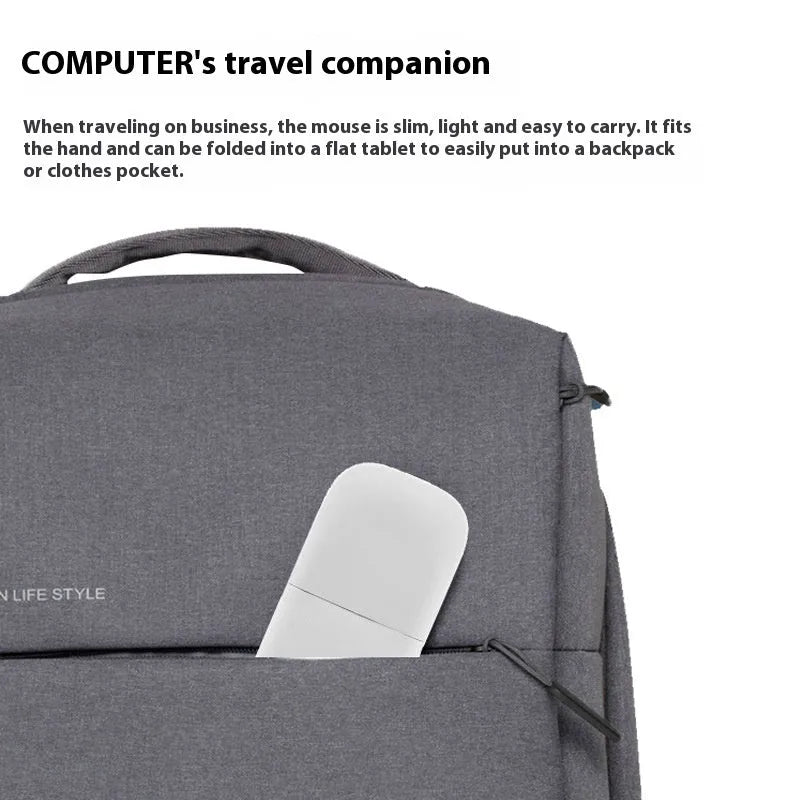 Folded Bluetooth wireless mouse showing compact 131.2mm length with touch surface and multiple colour options