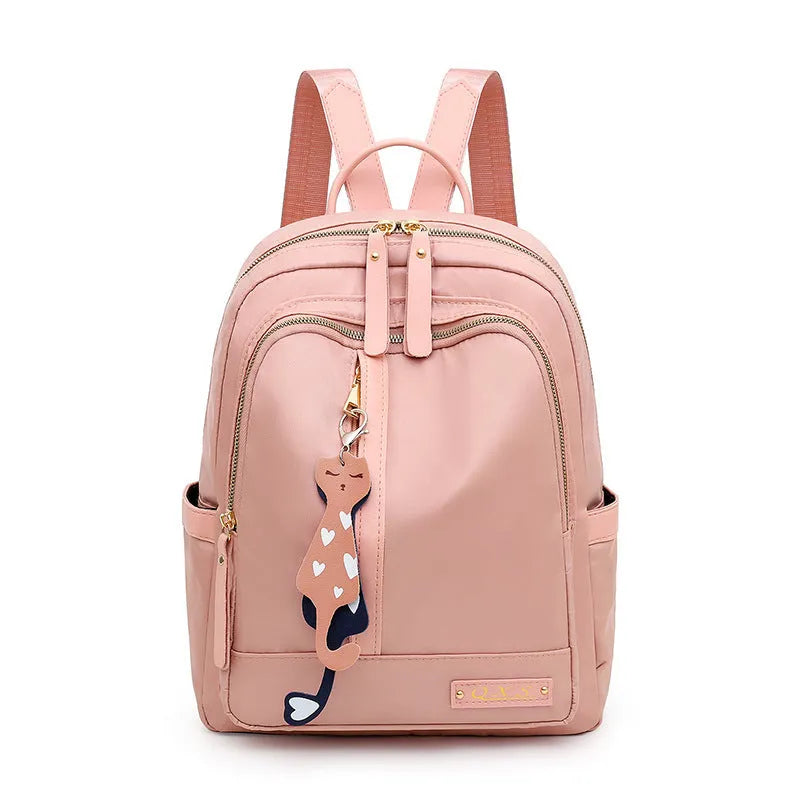 Women's black nylon casual backpack with multiple compartments and double shoulder straps