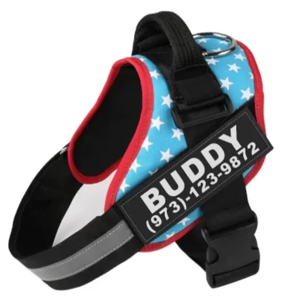 A reflective adjustable no-pull dog harness in a vest style, shown on a dog with a personalised patch.