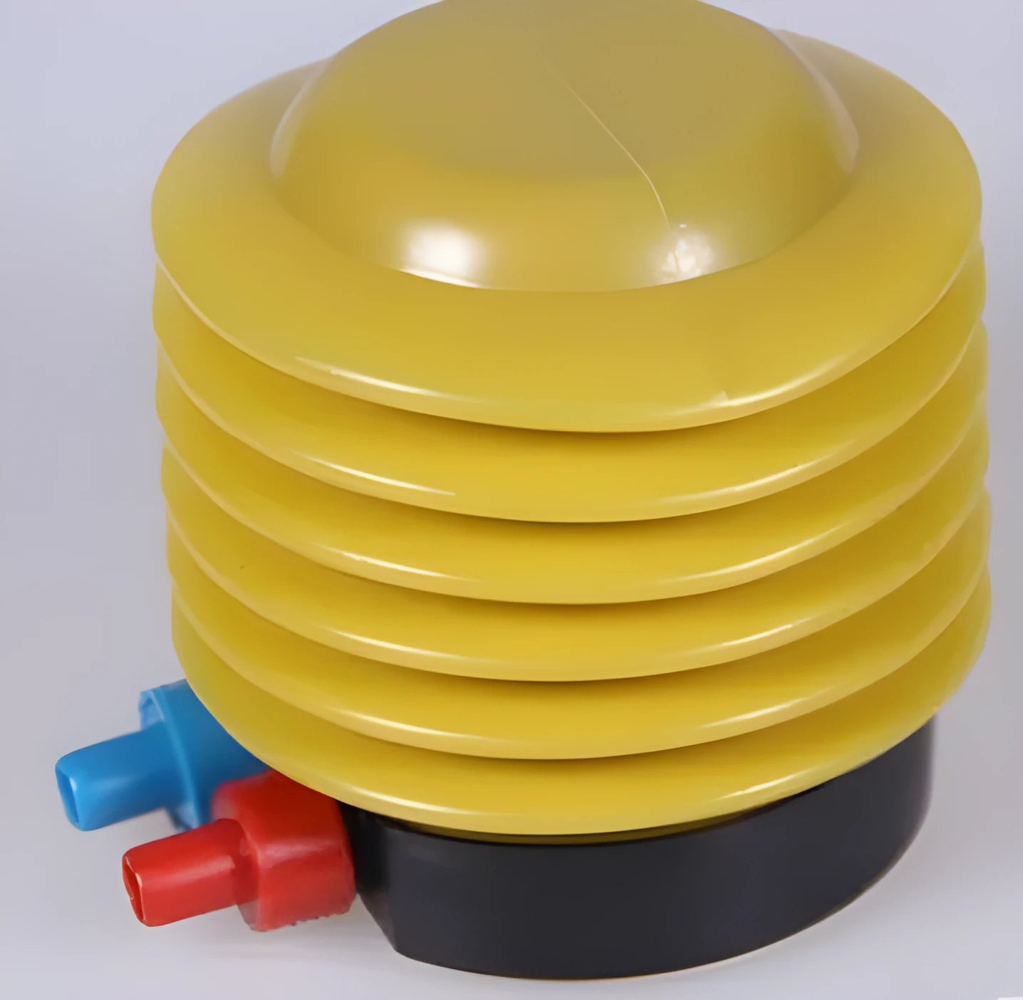 Blue and red plastic pedal pump for manual swim ring inflation with foot pedal