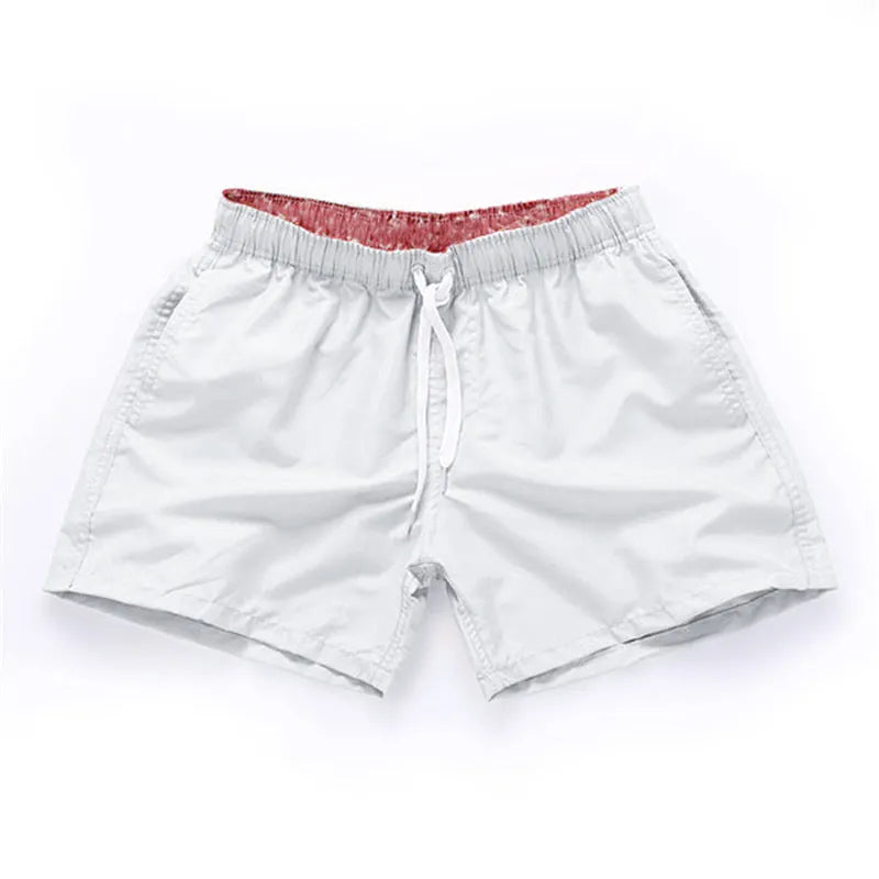 Men's straight-leg beach shorts in polyester fabric, shown in multiple colours and plus sizes.