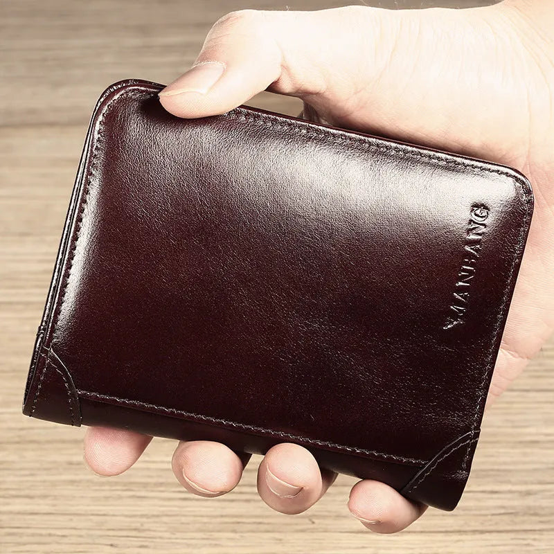 Men's black leather wallet open to show internal compartments: photo slot, card slots, banknote folder, and change pocket.