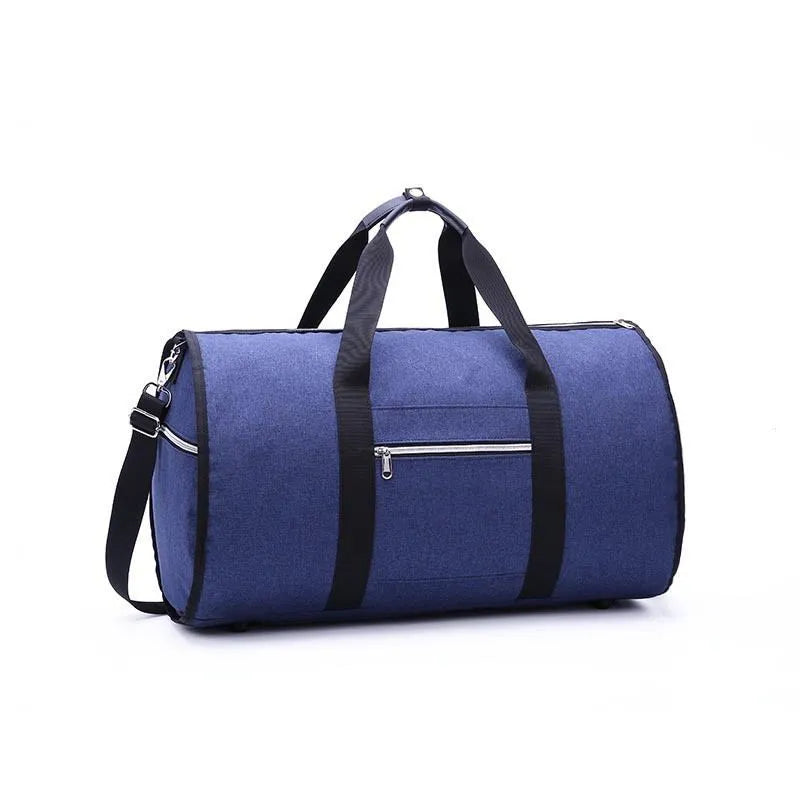 Medium-sized cylindrical travel bag in Oxford cloth, shown in one of four colours: black, blue, light grey, or red.