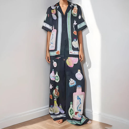 Black women's casual set with cartoon print cardigan top and matching trousers