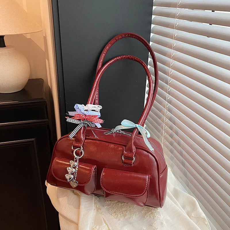 Retro pillow-shaped women's handbag in PU leather with double shoulder strap