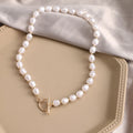 Vintage gold necklace with heart pendant on pearl chain, adjustable 41-50cm length