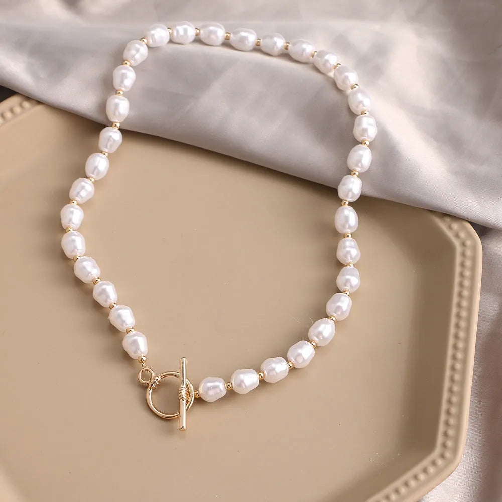 Vintage gold necklace with heart pendant on pearl chain, adjustable 41-50cm length