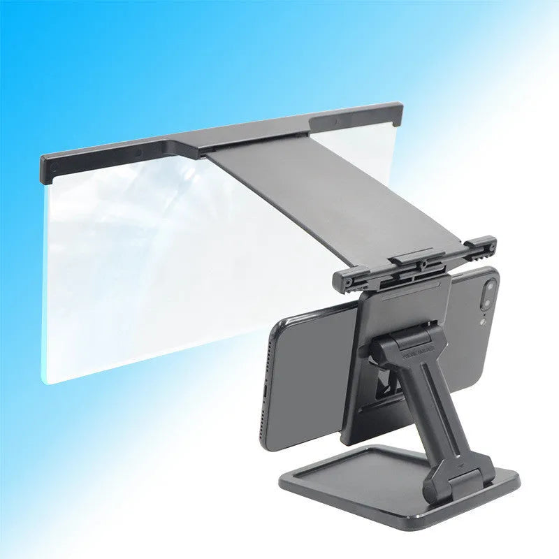 Black L20 split-screen mobile phone magnifier and separate phone bracket on a table.