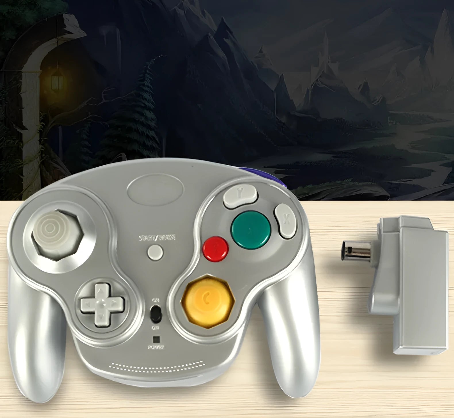 NGC 2.4G wireless game controller for Wii and GameCube consoles in various colours on a white background.