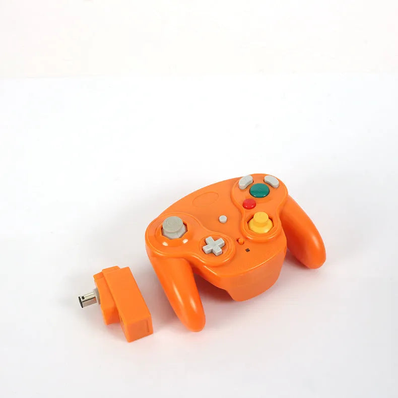 NGC 2.4G wireless game controller for Wii and GameCube consoles in various colours on a white background.