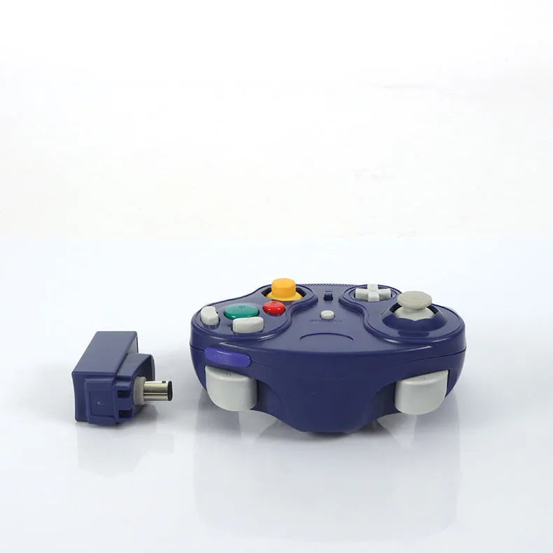 NGC 2.4G wireless game controller for Wii and GameCube consoles in various colours on a white background.