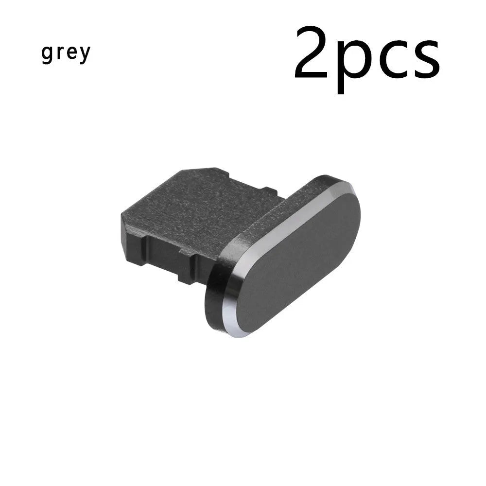 Aluminium alloy charging port dust plug for iPhone in various colours including gold, silver, blue, and rose gold.