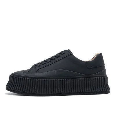 Women's black suede mid-top platform trainers with cross-binding lace-up back