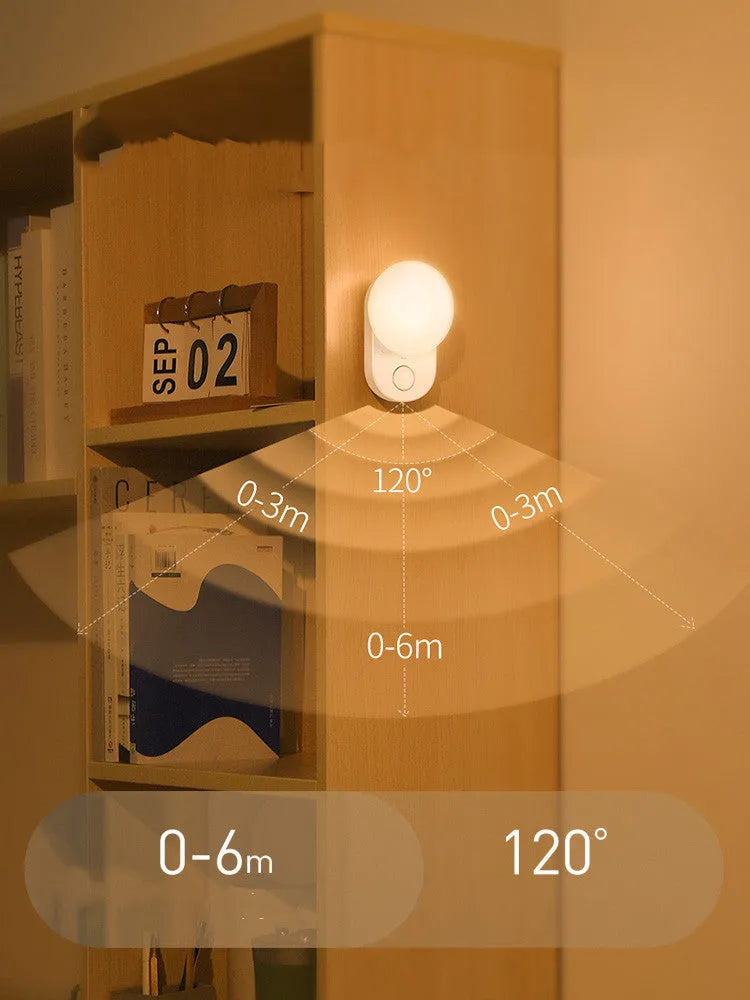 White Baseus rechargeable sensor night light with motion detection and warm LED glow.