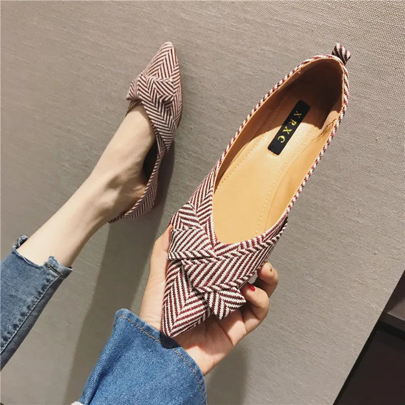 Women's pointed toe shallow mouth shoes with low flat heel in red or black colours