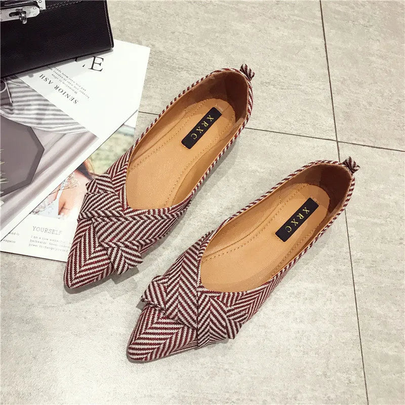 Women's pointed toe shallow mouth shoes with low flat heel in red or black colours