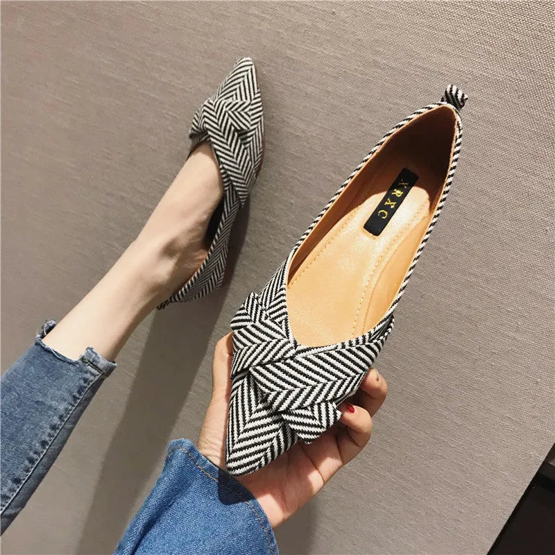 Women's pointed toe shallow mouth shoes with low flat heel in red or black colours