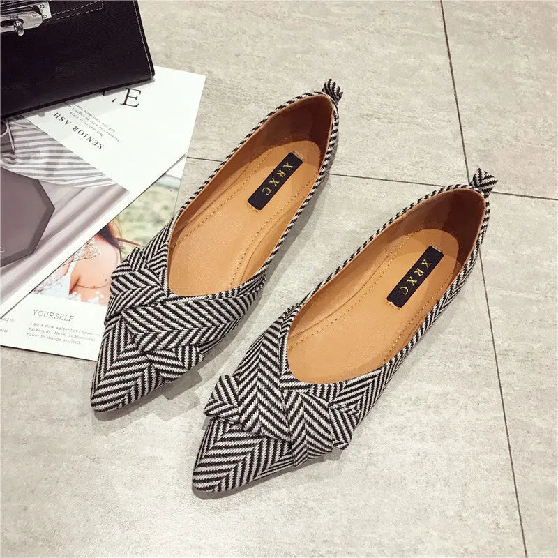 Women's pointed toe shallow mouth shoes with low flat heel in red or black colours