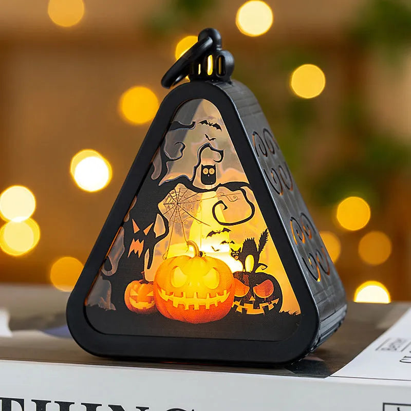 Portable Halloween pumpkin lamp decoration in four colours measuring 8.9 by 5.2 by 11.5 centimetres