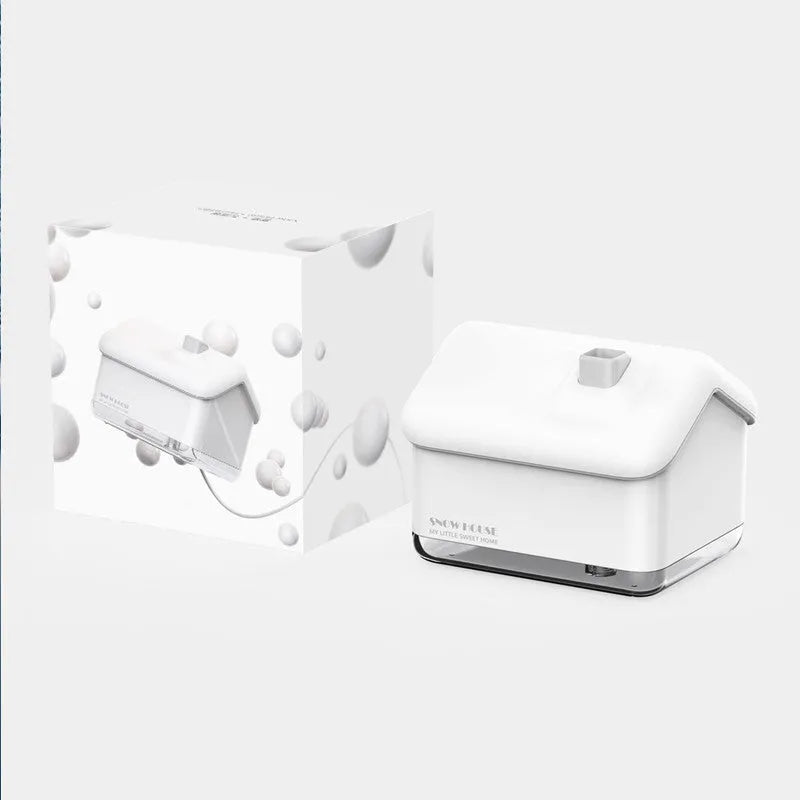 White ultrasonic humidifier and essential oil diffuser with LED light showing mist output