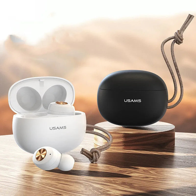 Wireless Bluetooth Mini TWS Pebble Series earbuds in charging case with white black dark green colour options