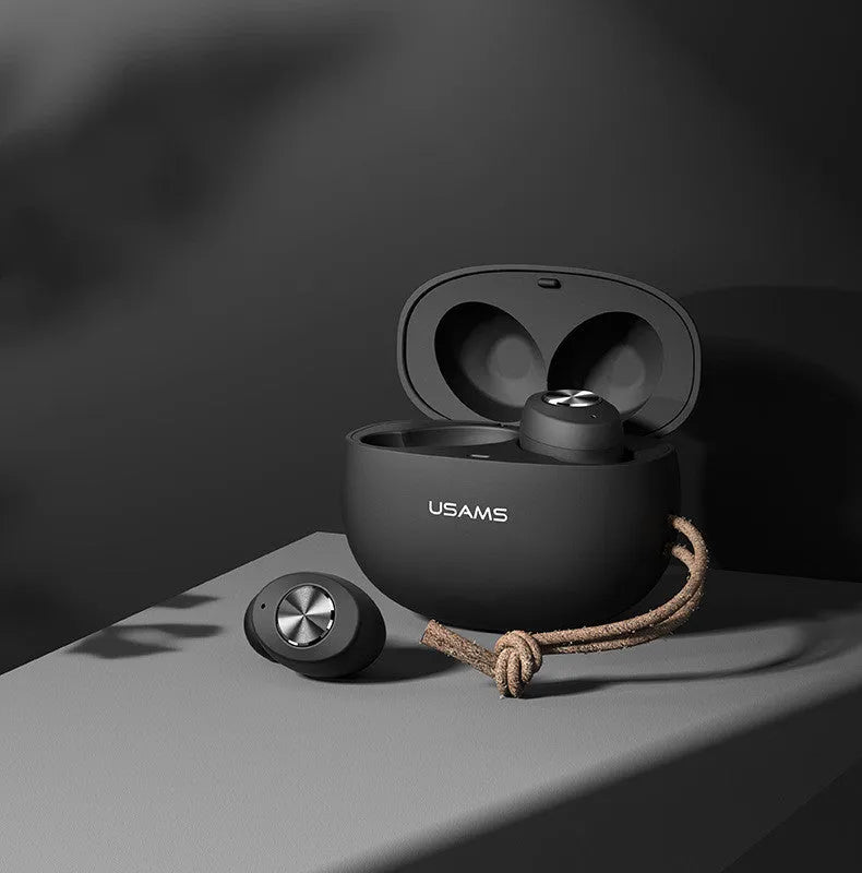 Wireless Bluetooth Mini TWS Pebble Series earbuds in charging case with white black dark green colour options