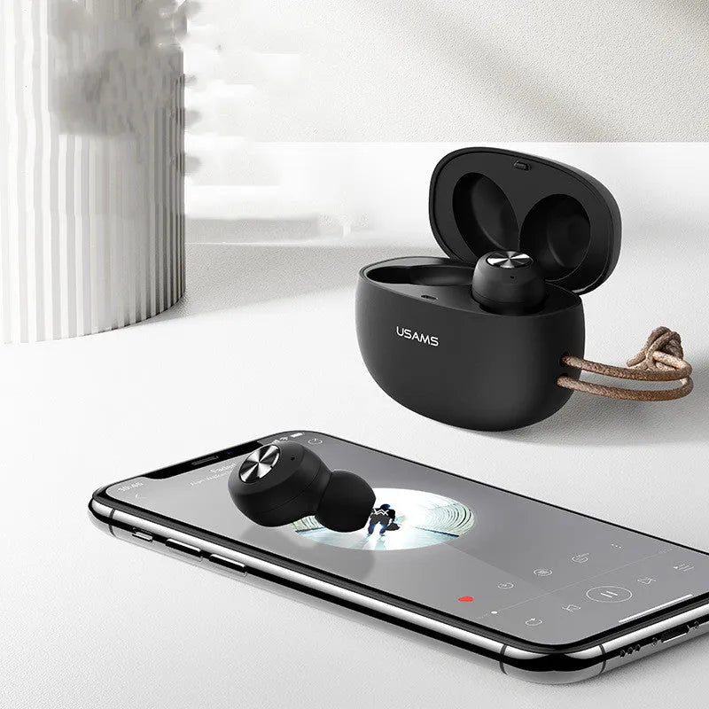 Wireless Bluetooth Mini TWS Pebble Series earbuds in charging case with white black dark green colour options