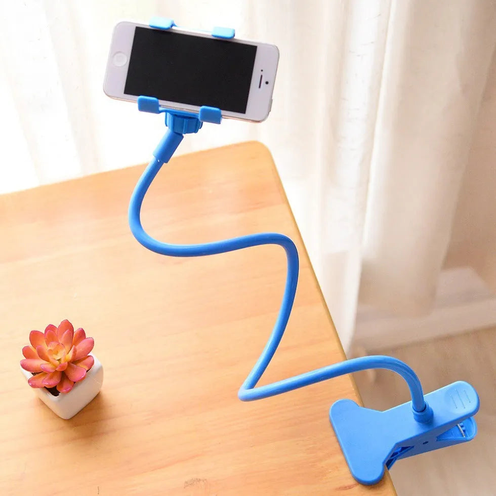 Black portable phone holder with a long 70cm flexible arm and a V-shaped clip mounted on a bed frame.