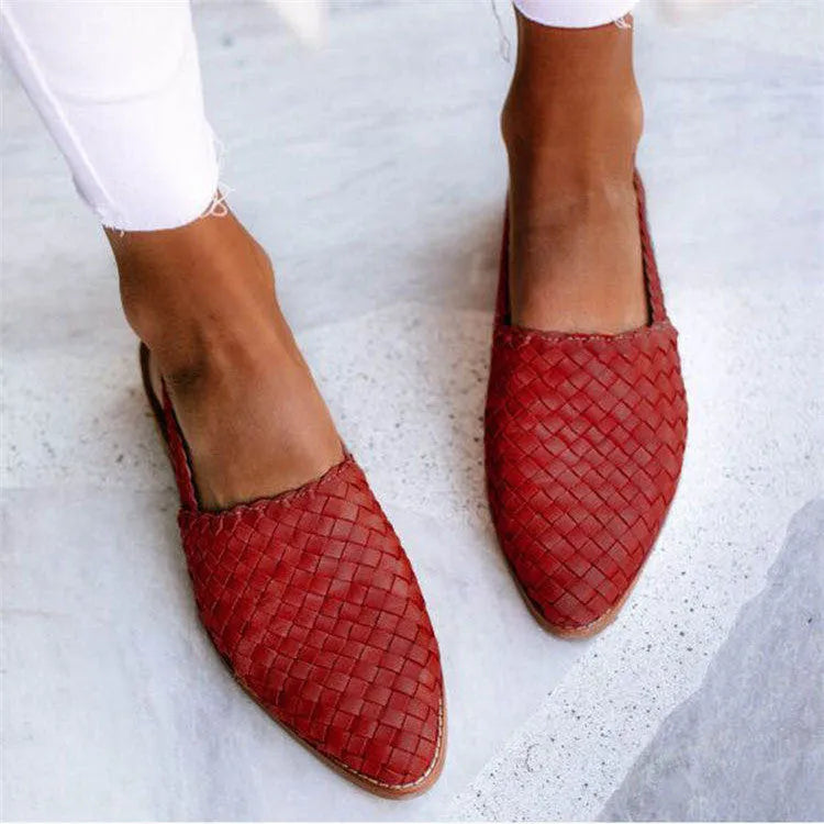 Baotou flat sandals with a buckle strap and pointed toe, shown in one of six available colours.