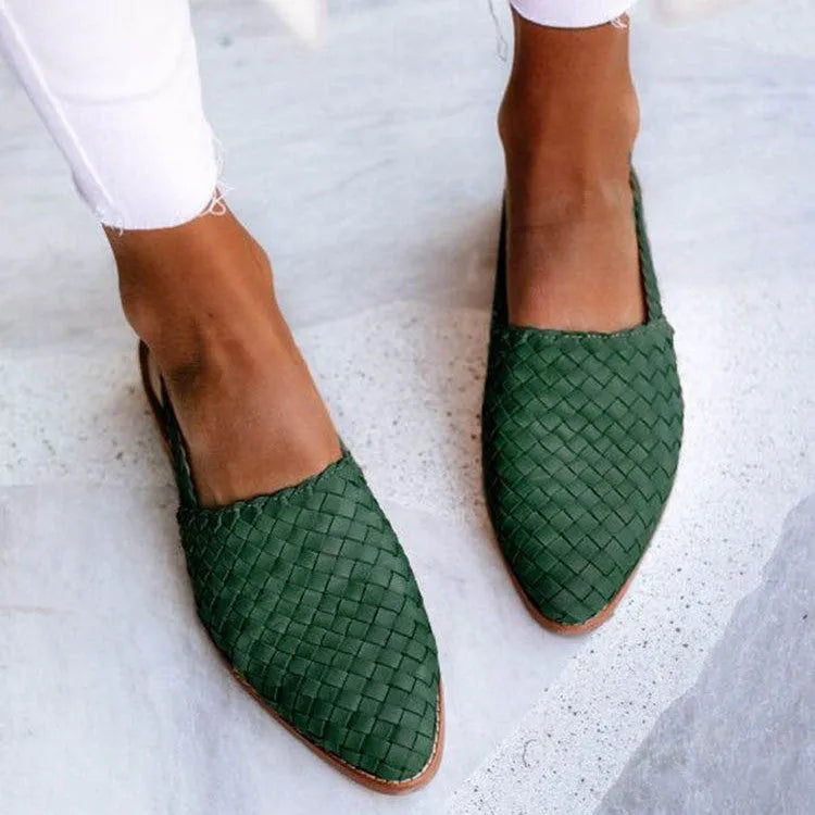 Baotou flat sandals with a buckle strap and pointed toe, shown in one of six available colours.