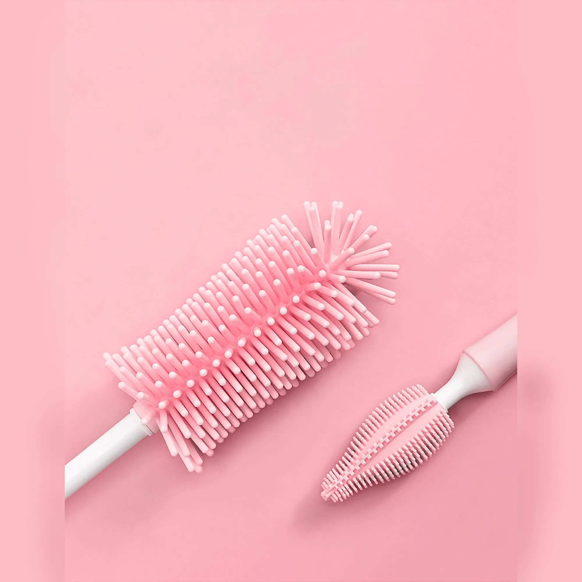 Silicone baby bottle brush set in pink blue and yellow colours for cleaning bottles and straws