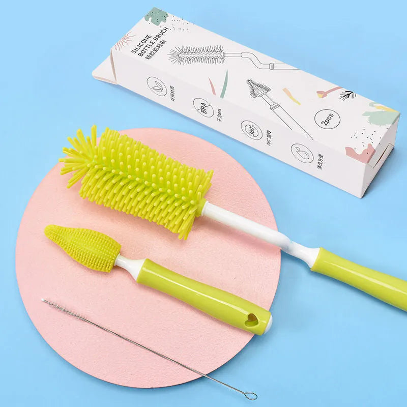 Silicone baby bottle brush set in pink blue and yellow colours for cleaning bottles and straws