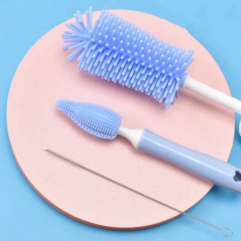 Silicone baby bottle brush set in pink blue and yellow colours for cleaning bottles and straws
