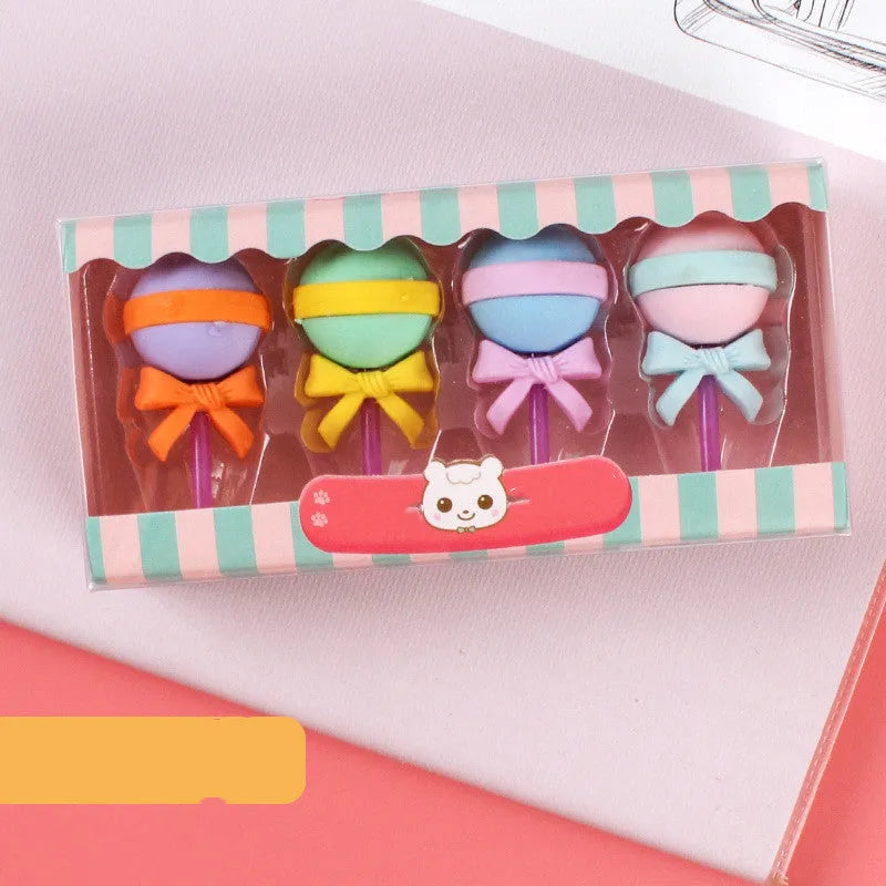 Set of 12 colourful cartoon food erasers including ice creams, donuts, lollipops, and cones.
