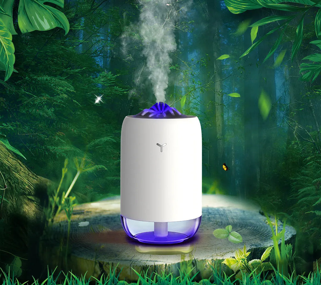 White Magic Flame ultrasonic humidifier and aroma diffuser on a wooden desk.
