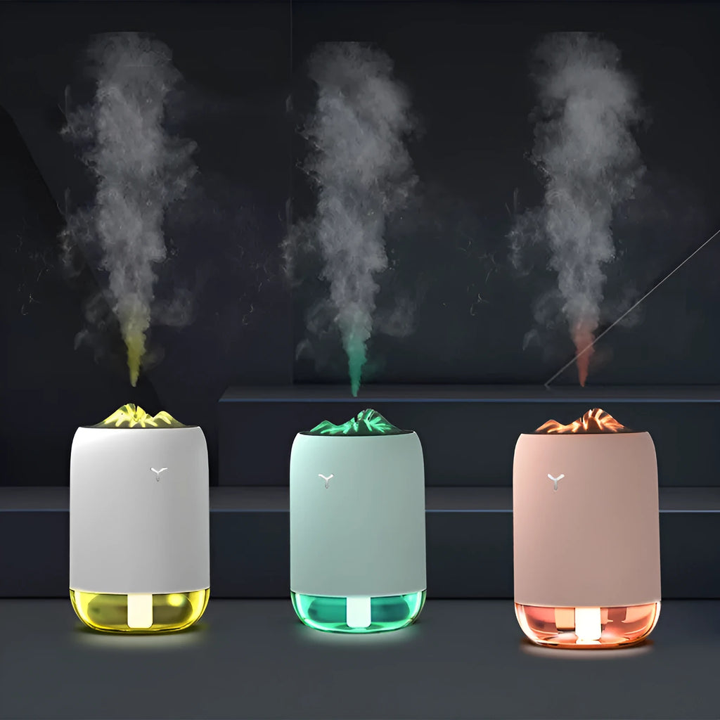 White Magic Flame ultrasonic humidifier and aroma diffuser on a wooden desk.