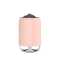 White Magic Flame ultrasonic humidifier and aroma diffuser on a wooden desk.