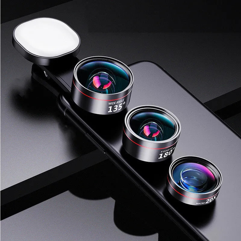 Universal fill light and clip-on lens kit for smartphone cameras with wide angle and macro lenses.