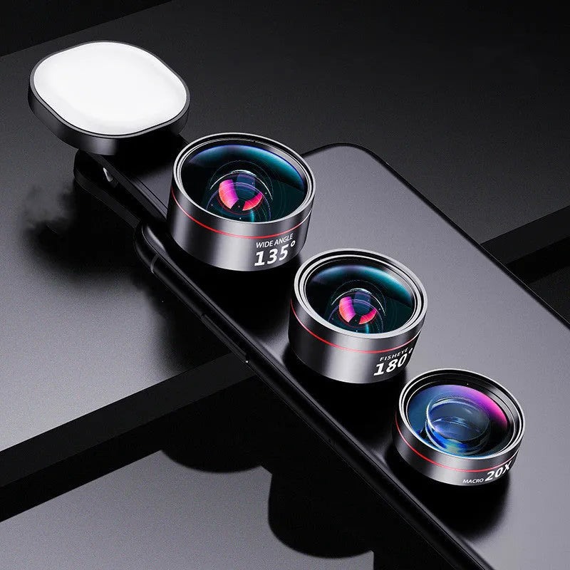 Universal fill light and clip-on lens kit for smartphone cameras with wide angle and macro lenses.