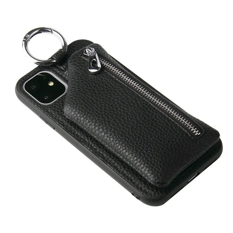 Pink imitation leather wallet phone case with detachable black lanyard attached.