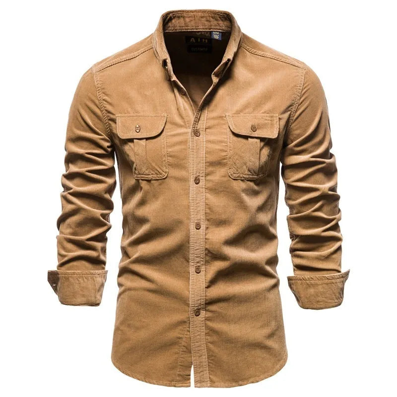 Men's denim blue long sleeve linen button-up shirt laid flat, showing button front and casual style.