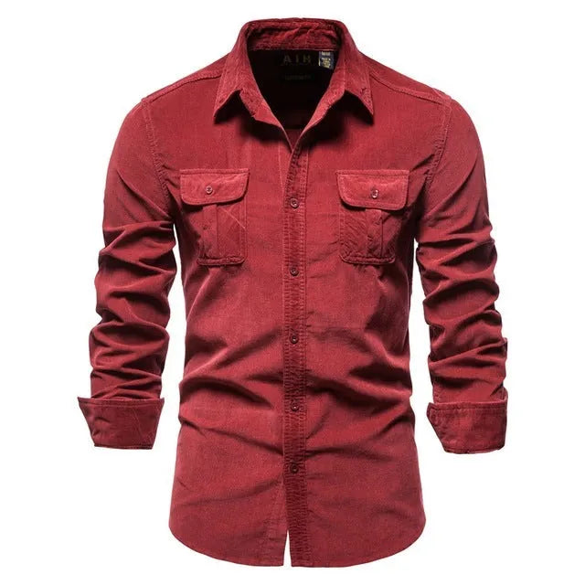 Men's denim blue long sleeve linen button-up shirt laid flat, showing button front and casual style.