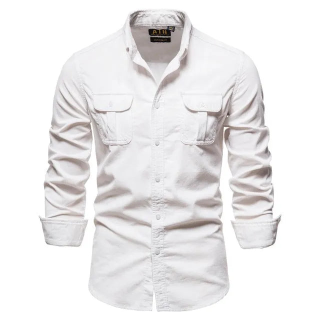 Men's denim blue long sleeve linen button-up shirt laid flat, showing button front and casual style.