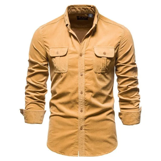 Men's denim blue long sleeve linen button-up shirt laid flat, showing button front and casual style.