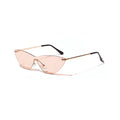 Brown vintage-style sunglasses with metal frame and tinted lenses.